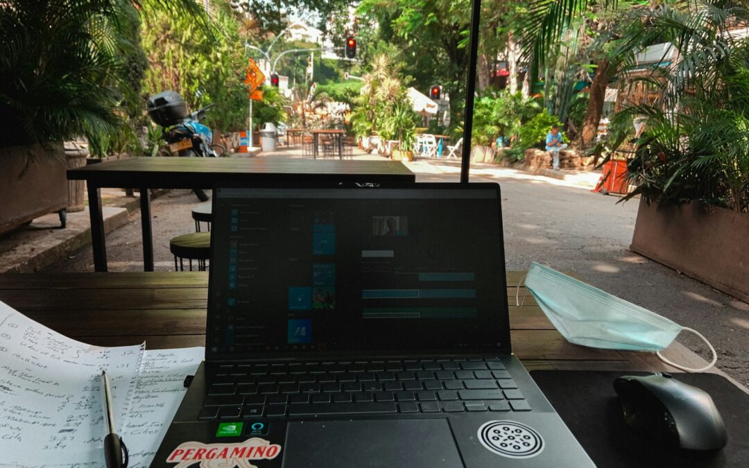 a laptop sits on a table